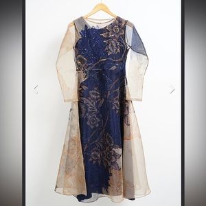Navy and beige dress made in sheer organza fabric.